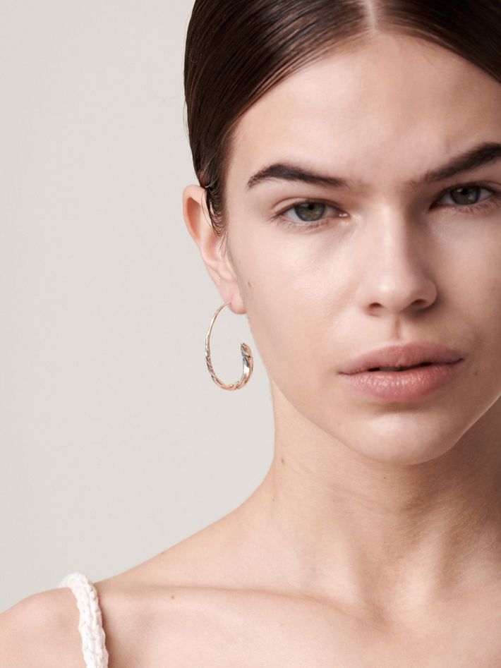 Large flow polished asymmetric hoops