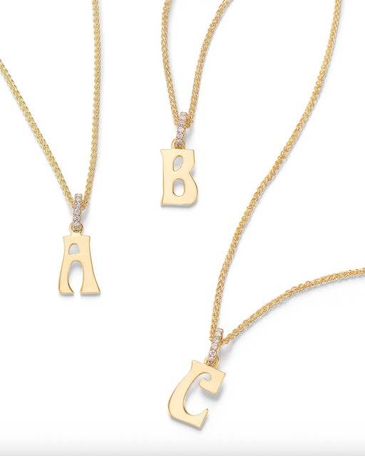 Letter charm with diamonds photo