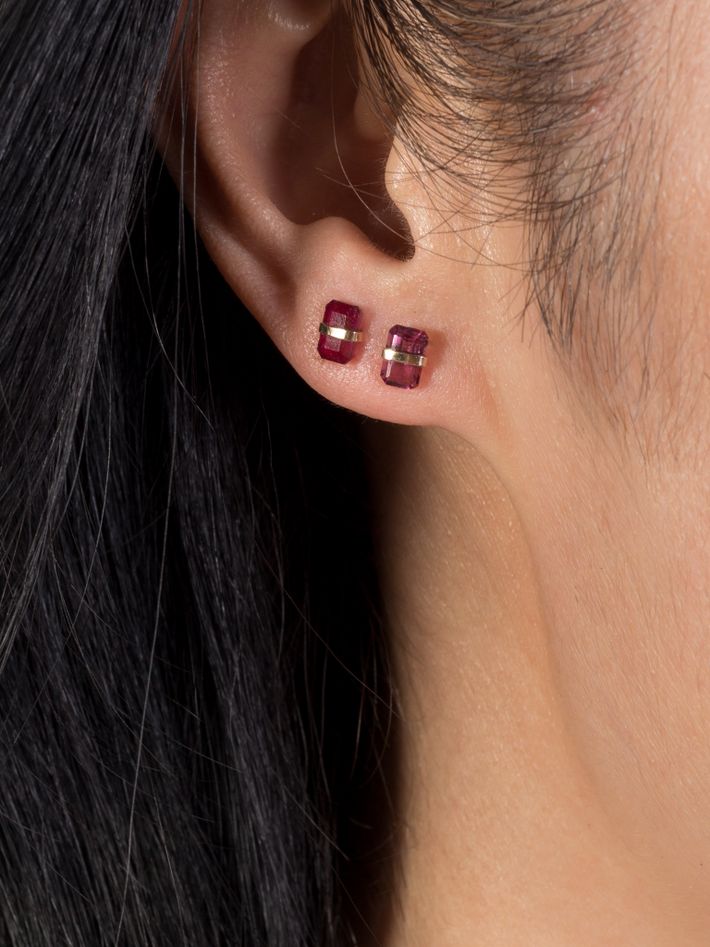 Bezel wrapped garnet stud earring