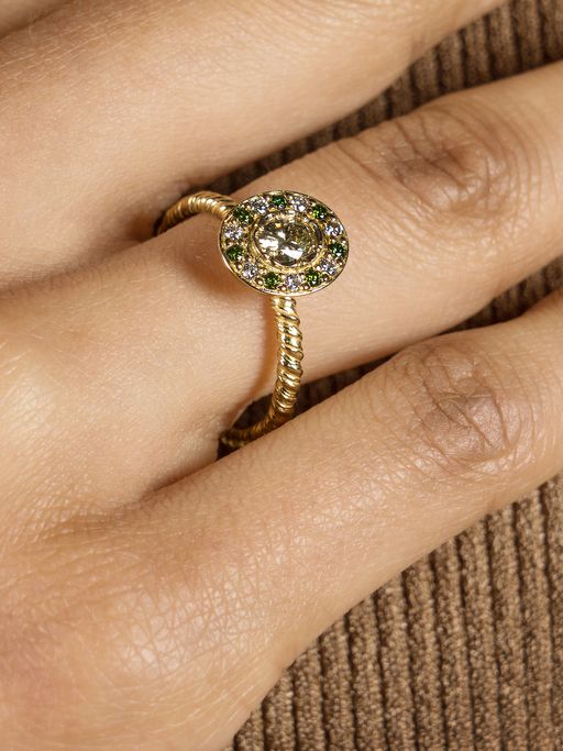 Green oval diamond engagement ring photo