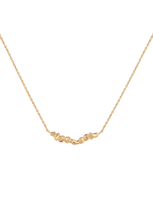 Gold nuggets on a string diamond necklace photo