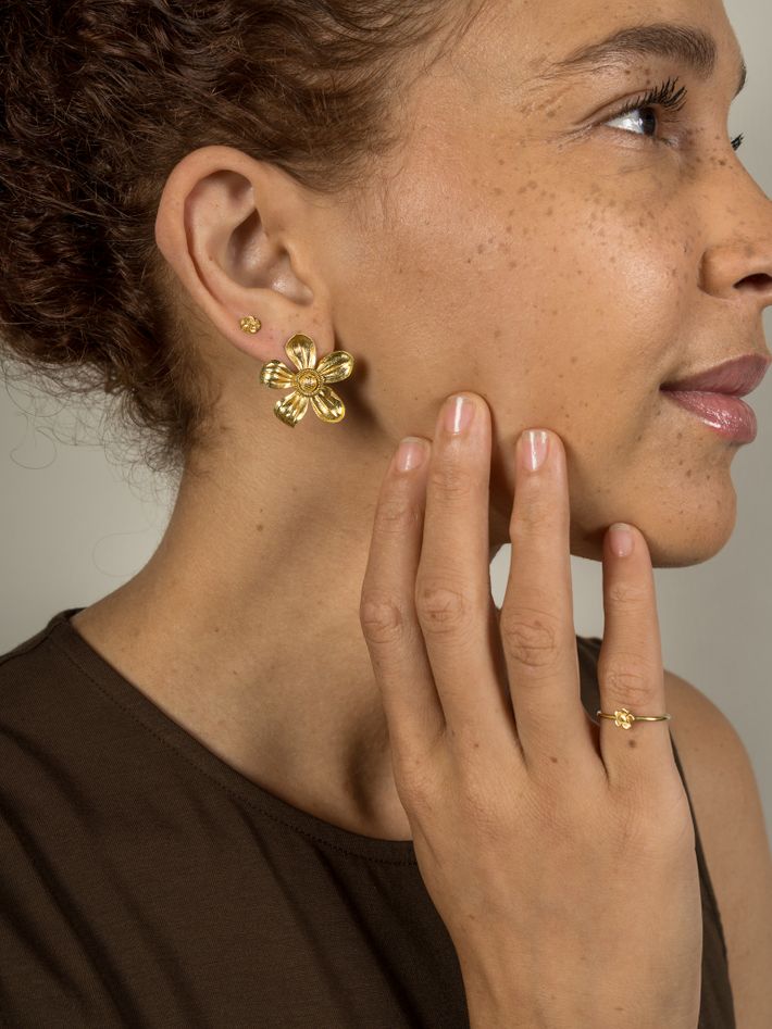 Gold flower stud earrings