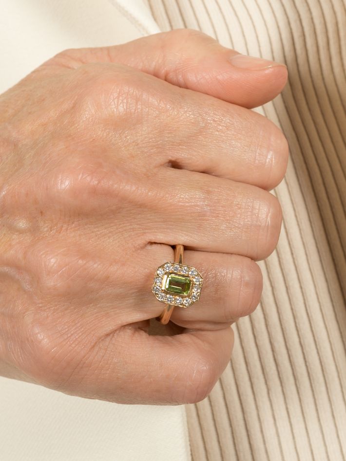 Emerald cut peridot halo ring