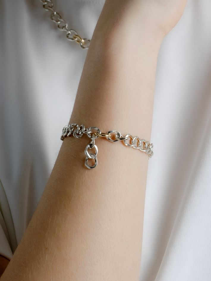 Lenk mini bracelet in silver with lock in 18k yellow gold