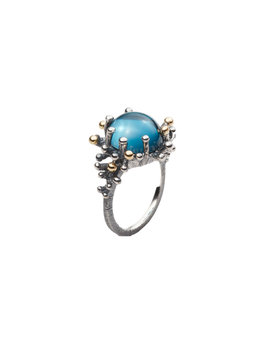 Sea anemone ring in silver and 18k yellow gold with london blue topaz photo