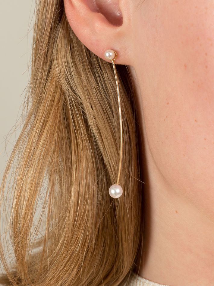 Extended twin pearl earrings