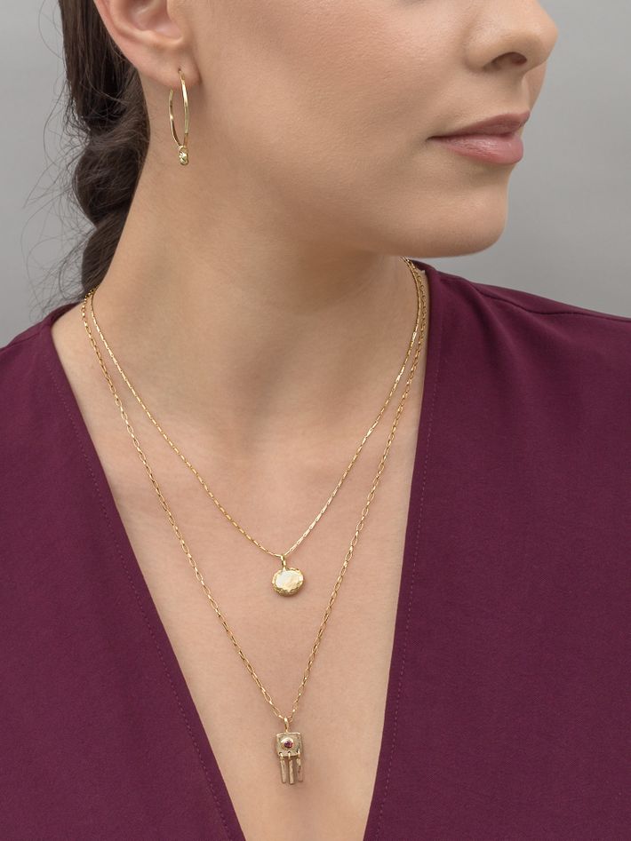 Deco pendant in gold