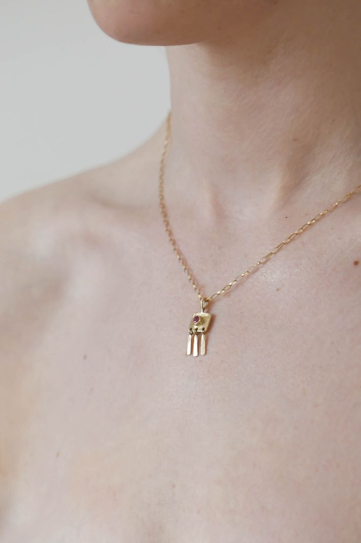 Deco pendant in gold